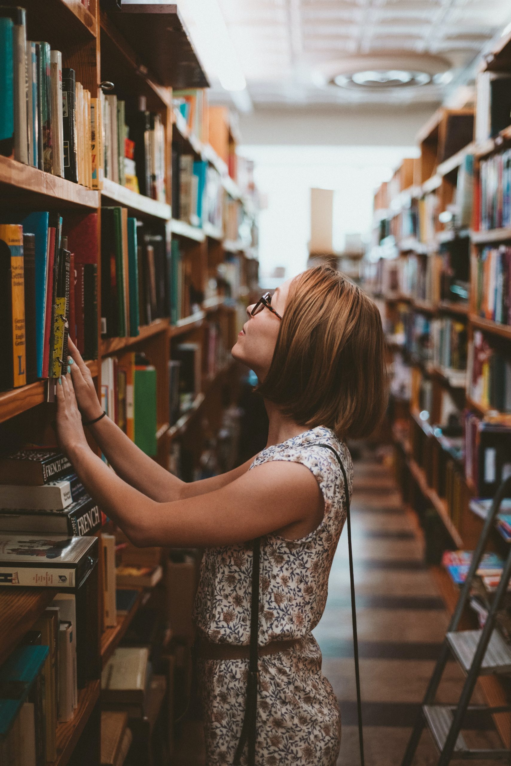 girl looking for books