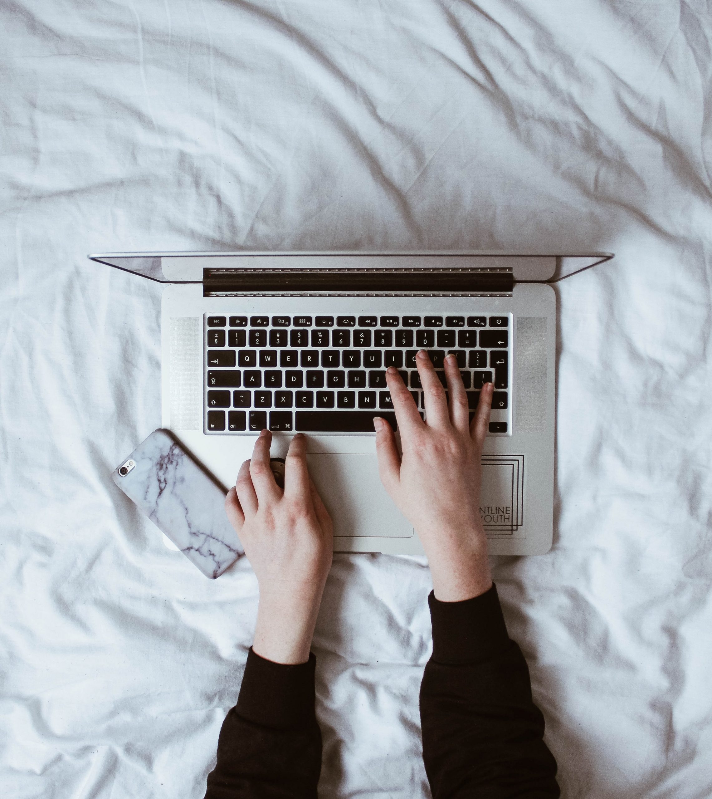 laptop on the bed